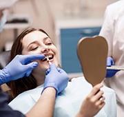 a patient undergoing a cosmetic dental process